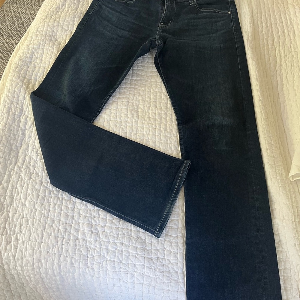 Men's AG jeans dark wash.